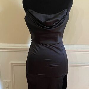 black satin cowl bodice gown with a slit